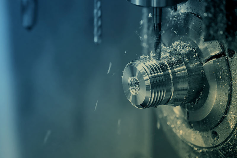 Swiss turning machine producing a small precision component
